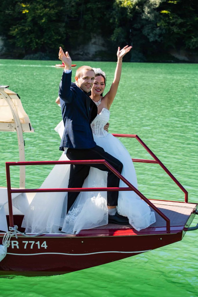 Arriving on a boat at our wedding