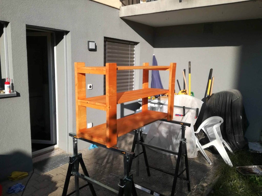 The shoe rack after first layer of stain