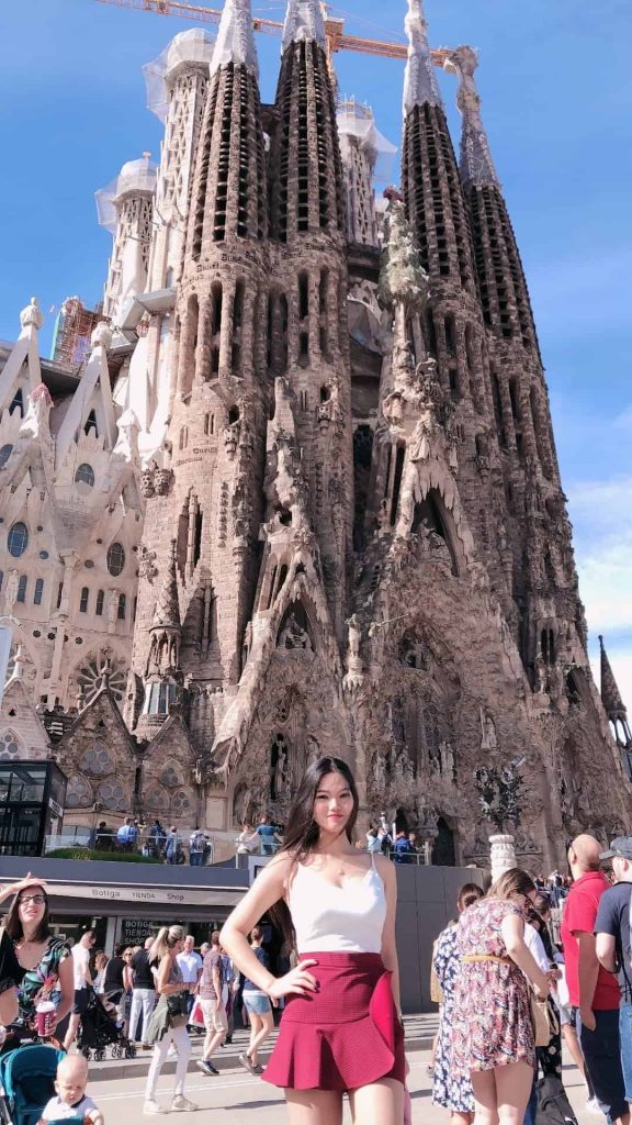 Mrs. The Poor Swiss in front of the Sagrada Familia